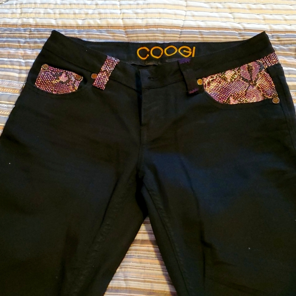 Black jeans with purple snake skin trim